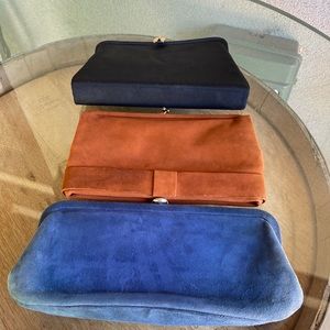 Lot of three Vintage clutch purses.